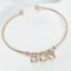 Genevra rozéarany és milk swarovski karperec