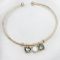 Genevra rozéarany és olive swarovski karperec